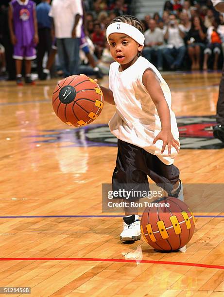 Child drives to the basket during the Vince Carter All-Star Charity Game at the Air Canada Centre on July 30, 2004 in Toronto, Canada. NOTE TO USER:...
