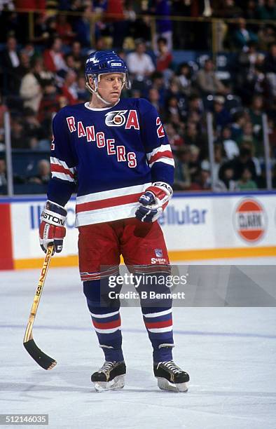 Brian Leetch of the New York Rangers skates on the ice during an NHL game in 1992.