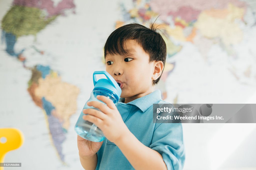 Little kid drinking water