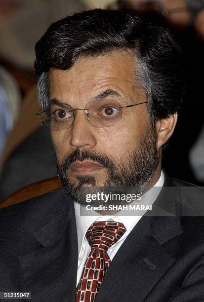 In this picture taken 22 August 2004. Afghan Presidential candidate Mohammad Younus Qanooni attends a joint news conference in Kabul. Qanooni,...