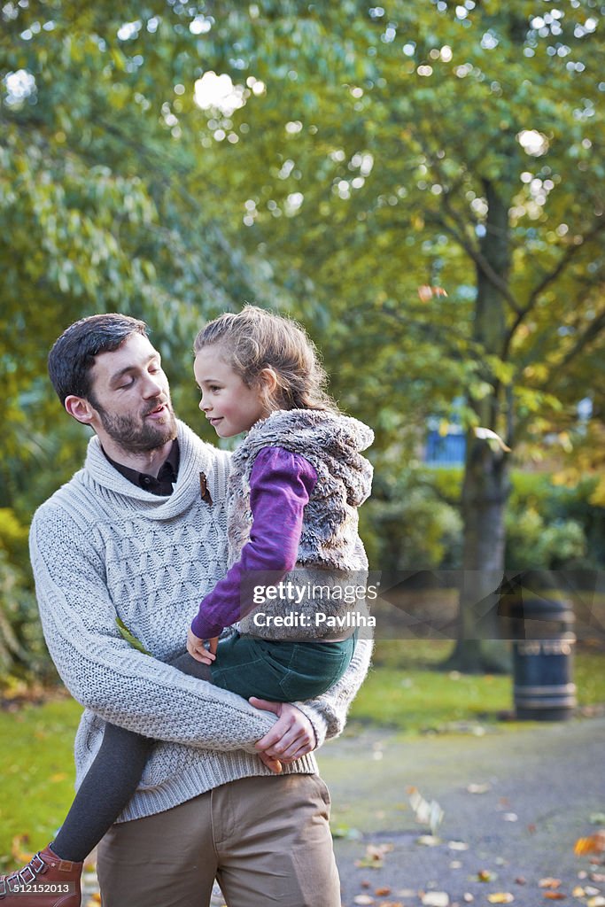 Father and Daughter in Park, London UK