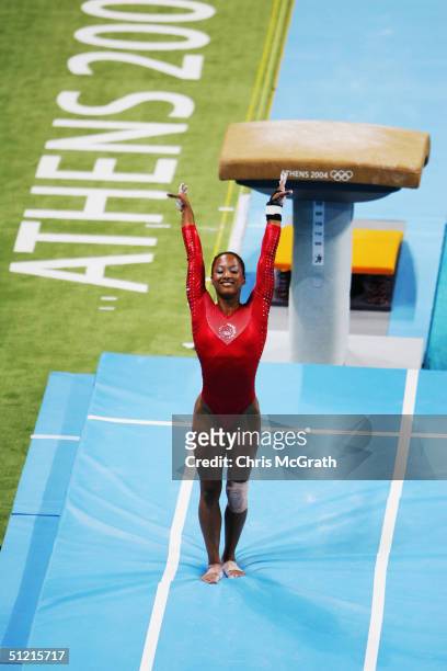 Annia Hatch of the USA competes during the women's artistic gymnastics vault event on August 22, 2004 during the Athens 2004 Summer Olympic Games at...