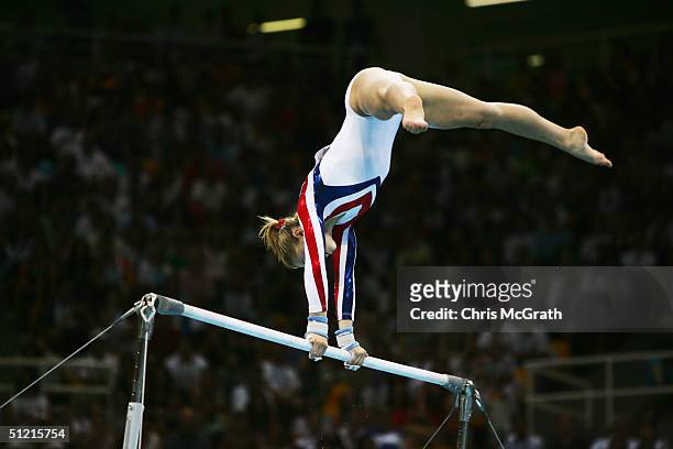 Courtney Kupets of the USA in the women's artistic gymnastics uneven bar finals on August 22, 2004 during the Athens 2004 Summer Olympic Games at the...
