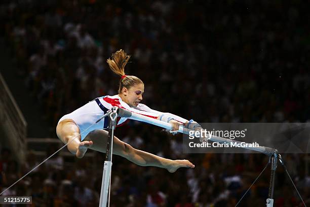 Courtney Kupets of the USA in the women's artistic gymnastics uneven bar finals on August 22, 2004 during the Athens 2004 Summer Olympic Games at the...