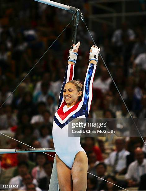 Courtney Kupets of the USA competes in the women's artistic gymnastics uneven bar finals on August 22, 2004 during the Athens 2004 Summer Olympic...