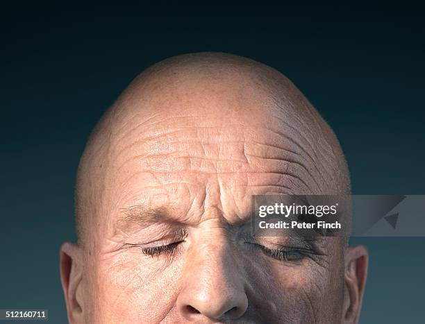 middle-aged man's face with eyes closed - occhi chiusi foto e immagini stock