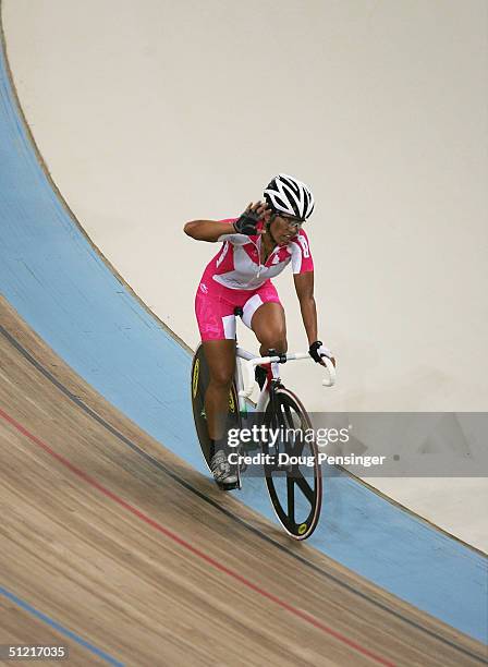 Belem Guerrero Mendez of Mexico waves to the crowd after winning silver in the women's track cycling points race final on August 25, 2004 during the...