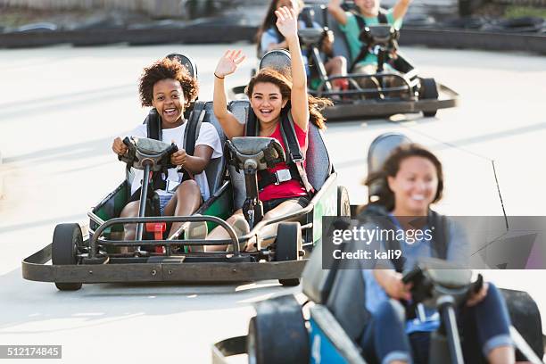 teenage girls on go cart - go carting stock pictures, royalty-free photos & images