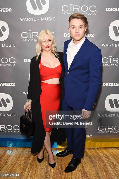 Roman Kemp and guest attend the Warner Music Group & Ciroc Vodka Brit Awards after party at Freemasons Hall on February 24, 2016 in London, England.