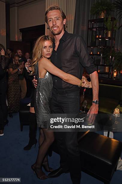 Abbey Clancy and Peter Crouch attend the Warner Music Group & Ciroc Vodka Brit Awards after party at Freemasons Hall on February 24, 2016 in London,...