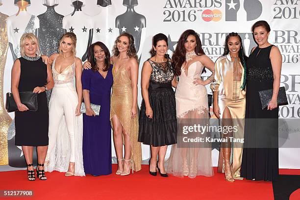 Perrie Edwards, Jade Thirlwall, Jesy Nelson and Leigh-Anne Pinnock of Little Mix with their mothers attend the BRIT Awards 2016 at The O2 Arena on...