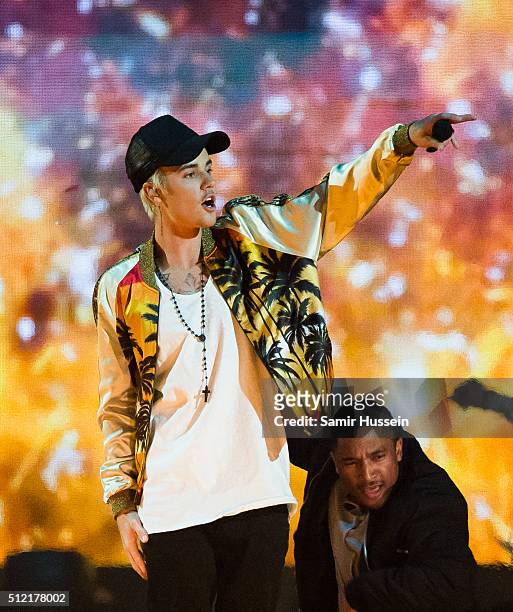 Justin Bieber performs live on stage at the BRIT Awards 2016 at The O2 Arena on February 24, 2016 in London, England.