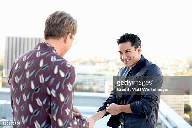 Stylist Derek Warburton and actor/TV Personality Mario Lopez prepare for a photo shoot for LaPalme Magazine at The Emerson on February 24, 2016 in...