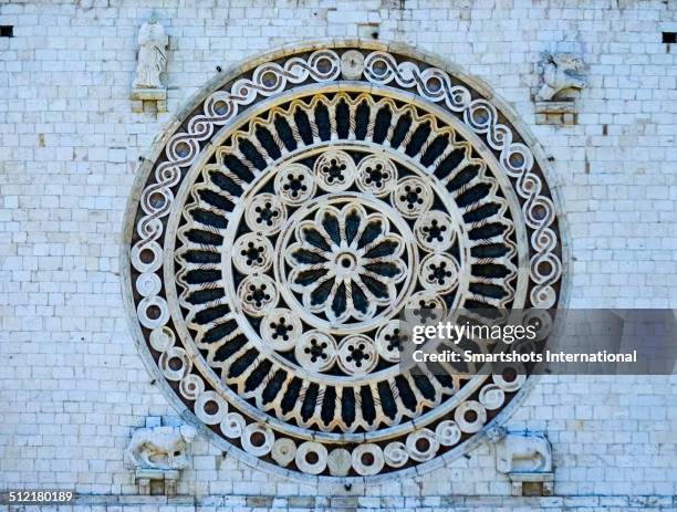 rose window of basilica of san francesco, assisi - rose window stock pictures, royalty-free photos & images