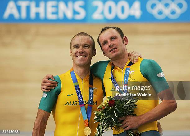 Stuart O'Grady and Graeme Brown of Australia celebrate after winning the gold medal in the men's track cycling madison event on August 25, 2004...