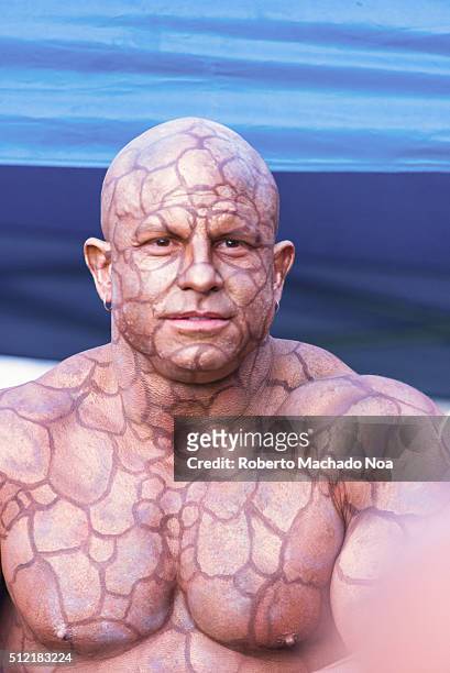 Man bodied painted as The Thing character in the Fantastic Four movie. He is advertising the film in the Greek Festival at Toronto.