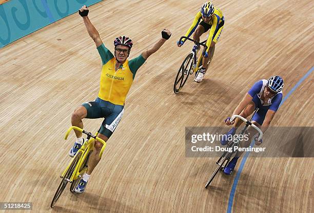 Stuart O'Grady of Australia celebrates winning the gold in the men's track cycling madison final on August 25, 2004 during the Athens 2004 Summer...