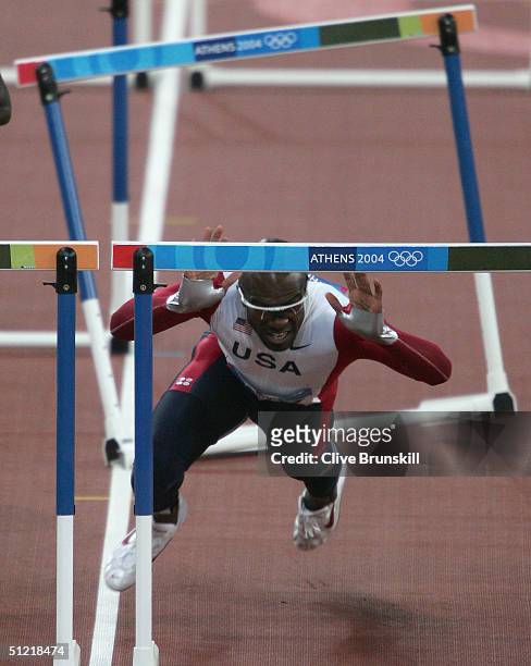 Allen Johnson of USA is seen as he falls during the men's 110 metre hurdle event on August 25, 2004 during the Athens 2004 Summer Olympic Games at...