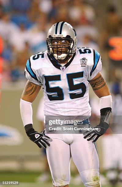 Linebacker Dan Morgan of the Carolina Panthers stands on the field during the preseason game against the New York Giants on August 19, 2004 at Bank...