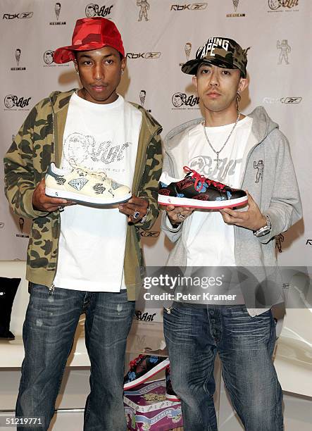 Singer Pharrell Williams and Nigo attend a press conference to announce the launch of the Billionare Boys Club apparel line and Ice Cream footwear...