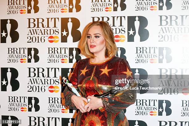 Adele poses in the winners room at the BRIT Awards 2016 at The O2 Arena on February 24, 2016 in London, England.