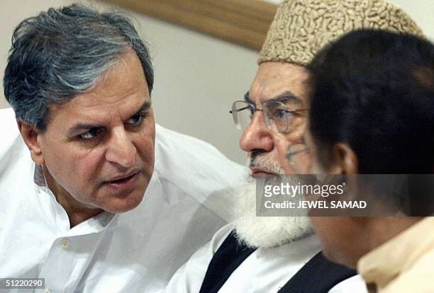 This file taken 27 June 2003 shows Pakistan's multi-party opposition leaders, Qazi Hussein Ahmed of the Jamat-e-Islami , Amin Fahim of the Pakistan...