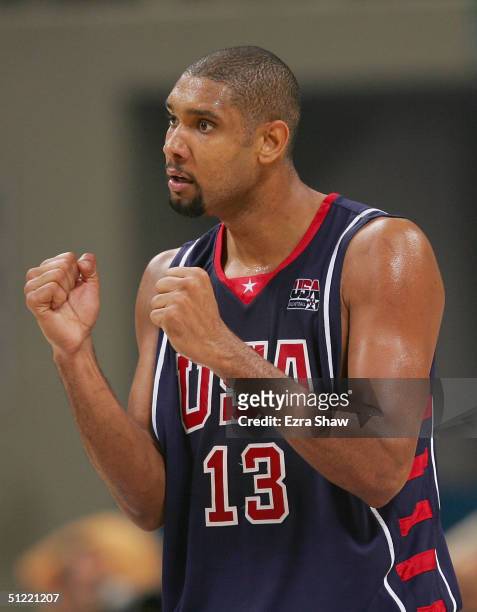 Tim Duncan of United States celebrates defeating Spain in the men's basketball quarterfinal game on August 26, 2004 during the Athens 2004 Summer...