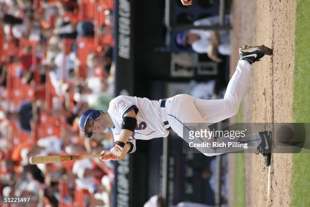 Infielder David Wright of the New York Mets swings at a Houston Astros pitch during the game at Shea Stadium on August 12, 2004 in Flushing, New...