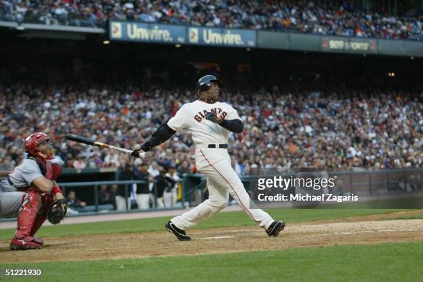 Barry Bonds of the San Francisco Giants swings at the pitch during the MLB game against the St. Louis Cardinals at SBC Park on August 1, 2004 in San...
