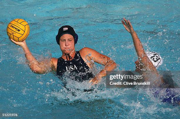 Kelly Rulon of the USA looks to pass the ball in the women's Water Polo bronze medal game on August 26, 2004 during the Athens 2004 Summer Olympic...