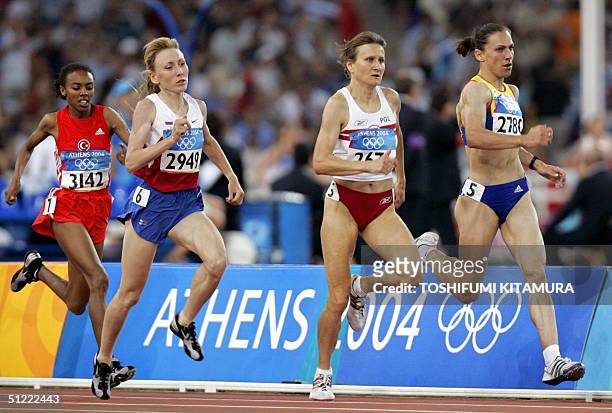 Turkey's Elvan Abeylegesse, Russia's Tatyana Tomashova, Poland's Anna Jakubczak, and Romania's Maria Cioncan, compete in the women's 1500m semi-final...