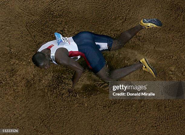 Dwight Phillips of USA competes during the men's long jump final on August 26, 2004 during the Athens 2004 Summer Olympic Games at the Olympic...