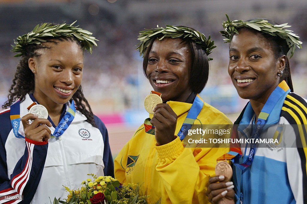 (From L) Silver medalist Allyson Felix o