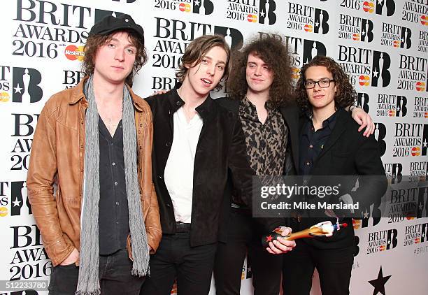 Johnny Bond, Ryan Van McCann, Bob Hall and Benji Blakeway from Catfish and the Bottlemen poses in the winners room at the BRIT Awards 2016 at The O2...