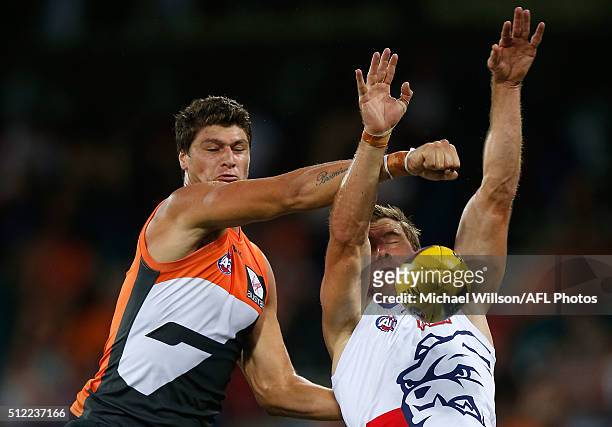 Jonathon Patton of the Giants and Dale Morris of the Bulldogs compete for the ball during the 2016 NAB Challenge match between the GWS Giants and the...