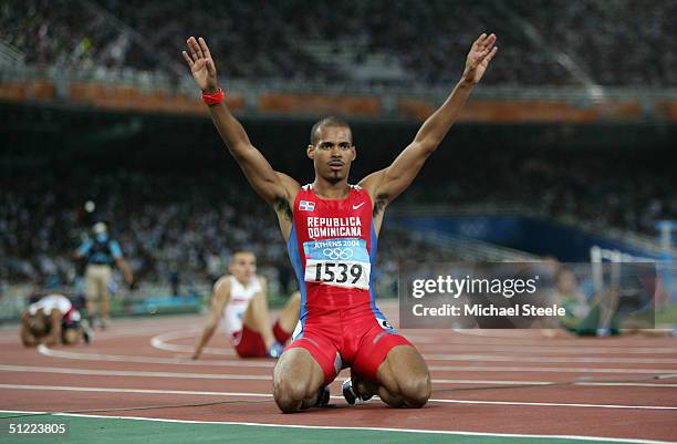 Felix Sanchez of Dominican Island celebrates after he won gold the men's 400 metre hurdle final on August 26, 2004 during the Athens 2004 Summer...