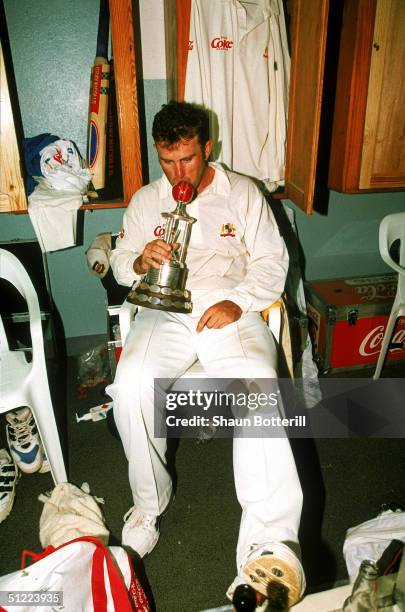 Mark Taylor of Australia kisses the Frank Worrell Trophy after the teams victory during the 4th Test Match between the West Indies and Australia May...