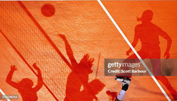 Players shadows are seen on the court during the China v Cuba women's indoor Volleyball semifinal match on August 26, 2004 during the Athens 2004...