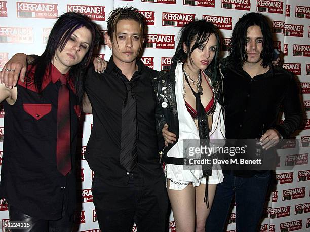 International Noise Conspiracy pose in the media room at the 11th annual "Kerrang Awards 2004" at The Brewery, East London on August 26, 2004 in...