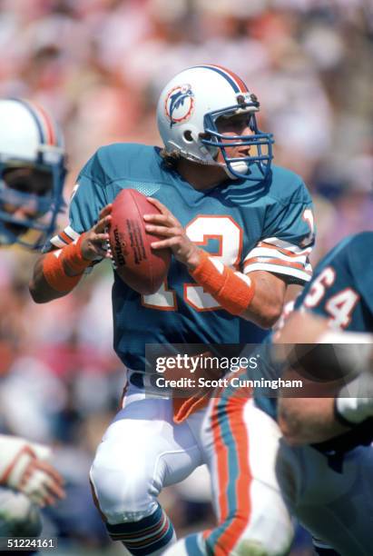 Quarterback Dan Marino of the Miami Dolphins drops back to pass during a game against the Washington Redskins at RFK Memorial Stadium on September 2,...