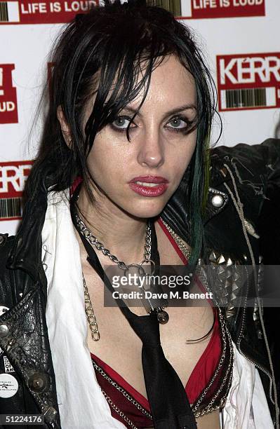 Roxy Saint poses in the media room at the 11th annual "Kerrang Awards 2004" at The Brewery, East London on August 26, 2004 in London. The music...