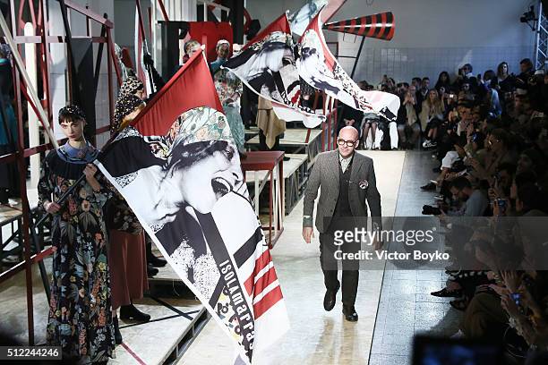 Designer Antonio Marras acknowledges the applause of the public after the I'M Isola Marras show during Milan Fashion Week Fall/Winter 2016/17 on...