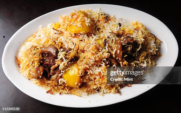 Special Lucknowi Bengali dish named, Calcutta Nawabi Mutton Biryani prepared by Manzilat Fatima at Ta'aam Restaurant on February 20, 2015 in Kolkata,...