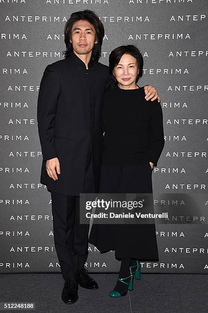 Designer Izumi Ogino and artist Tsuchida Yasuhiko attend the Anteprima show during Milan Fashion Week Fall/Winter 2016/17 on February 25, 2016 in...