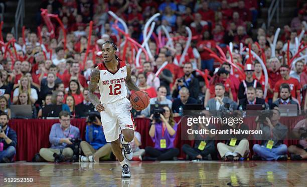 Anthony "Cat" Barber of the North Carolina State Wolfpack moves the ball against the North Carolina State Wolfpack during their game at PNC Arena on...