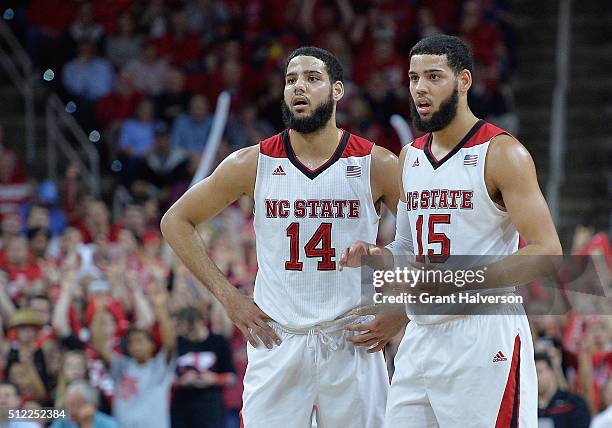 Caleb Martin and Cody Martin of the North Carolina State Wolfpack during their game against the North Carolina Tar Heels at PNC Arena on February 24,...