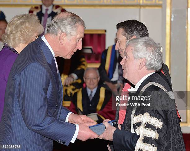 Prince Charles, Prince of Wales speaks withwith Professor Timothy O'Shea of the University of Edinburgh, during the presentation of The Queen's...