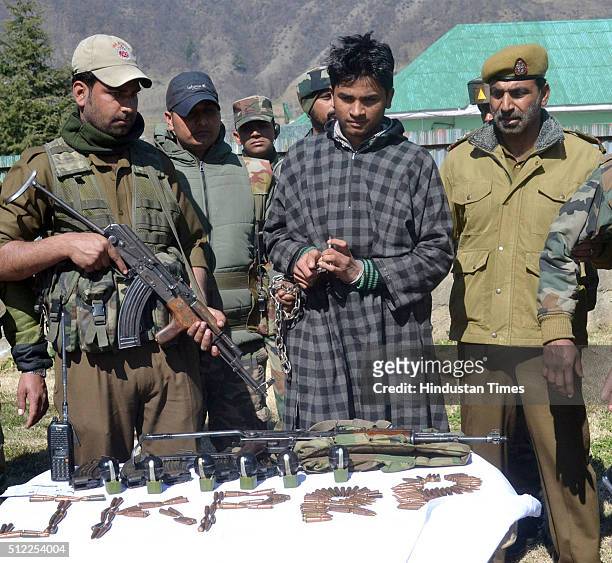 Mohammad Sadiq Gujjar Jaish-e-Mohammad militant presented to media by Indian security forces at the DIG's office in North Kashmir's Baramulla...