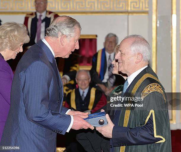 Prince Charles, Prince of Wales with Professor Brian Cantor of the University of Bradford, during the presentation of The Queen's Anniversary Prizes...