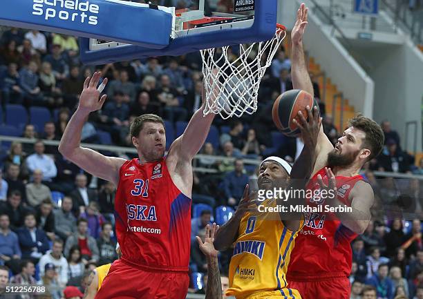 Tyrese Rice, #0 of Khimki Moscow Region competes with Victor Khryapa, #31 and Joel Freeland, #19 of CSKA Moscow in action during the 2015-2016...